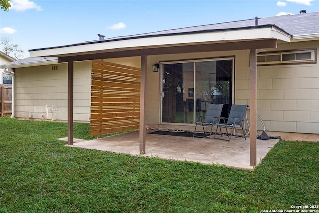 7722 Strolling Ln, Live Oak, TX 78233 - rear view of property with a patio area, fence, and a yard