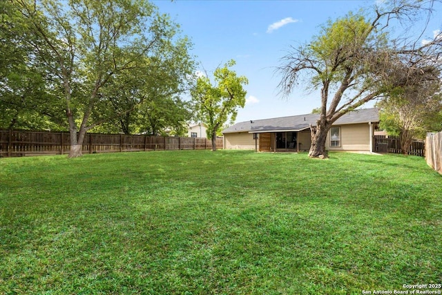 7722 Strolling Ln, Live Oak, TX 78233 - view of yard featuring a fenced backyard
