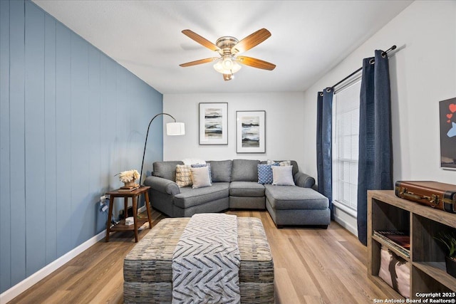 7722 Strolling Ln, Live Oak, TX 78233 - living area with baseboards, a ceiling fan, and light wood finished floors