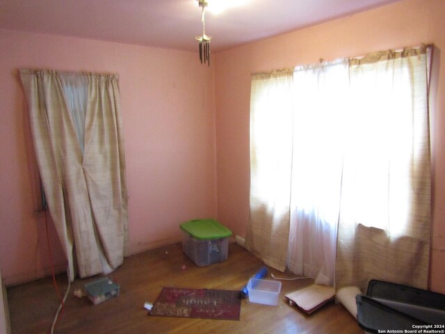 217 Lancaster, San Antonio, TX 78214 - interior space featuring plenty of natural light and wood finished floors