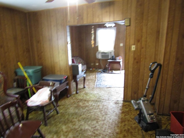 217 Lancaster, San Antonio, TX 78214 - interior space featuring carpet floors, wood walls, ceiling fan, and cooling unit