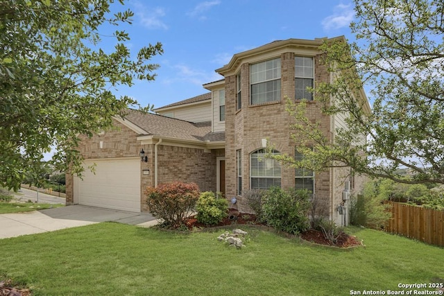 traditional-style house with driveway, brick siding, fence, a front lawn, and an attached garage