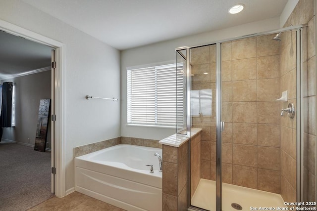 full bath featuring a stall shower and a bath