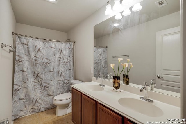 full bath with a sink, tile patterned flooring, toilet, and visible vents