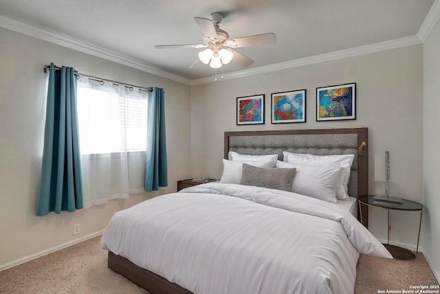 carpeted bedroom with baseboards, ornamental molding, and ceiling fan