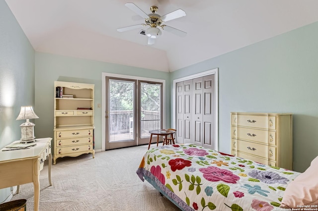 bedroom featuring a closet, ceiling fan, access to outside, carpet, and vaulted ceiling