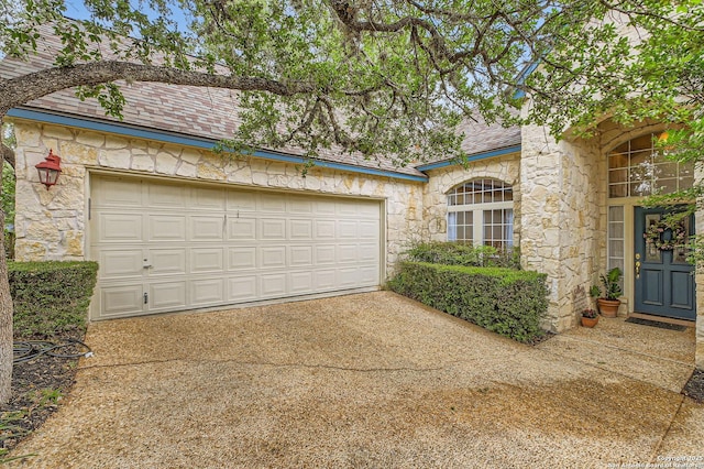 garage with driveway