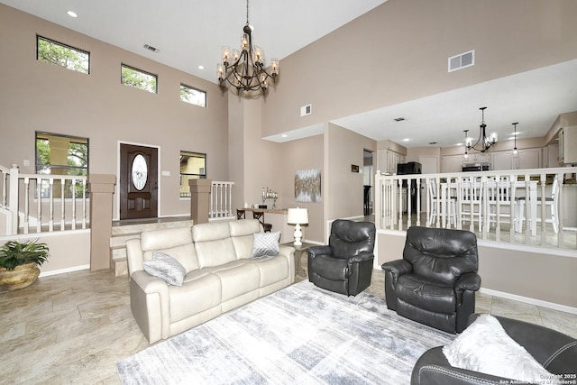 2928 Hidden Elm, San Antonio, TX 78261 - living room featuring a chandelier, visible vents, and a towering ceiling