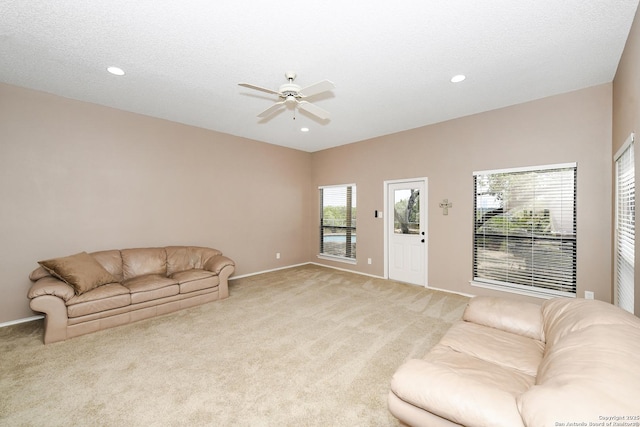 2928 Hidden Elm, San Antonio, TX 78261 - living room featuring ceiling fan, light colored carpet, and baseboards