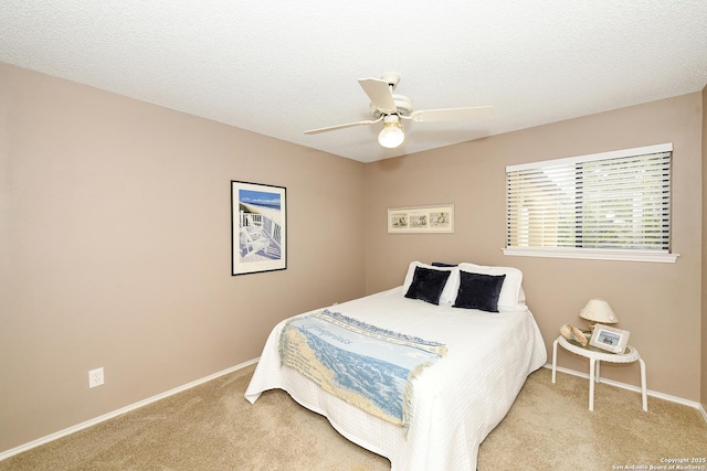2928 Hidden Elm, San Antonio, TX 78261 - bedroom featuring carpet floors, baseboards, and a ceiling fan