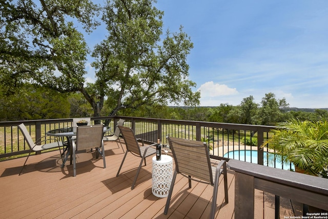 2928 Hidden Elm, San Antonio, TX 78261 - deck with outdoor dining area and a fenced in pool