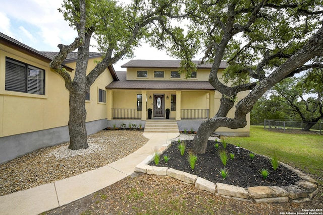 2928 Hidden Elm, San Antonio, TX 78261 - bungalow with a front lawn, fence, covered porch, roof with shingles, and stucco siding