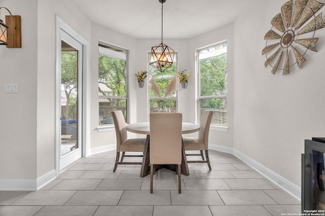 dining room with baseboards and wine cooler
