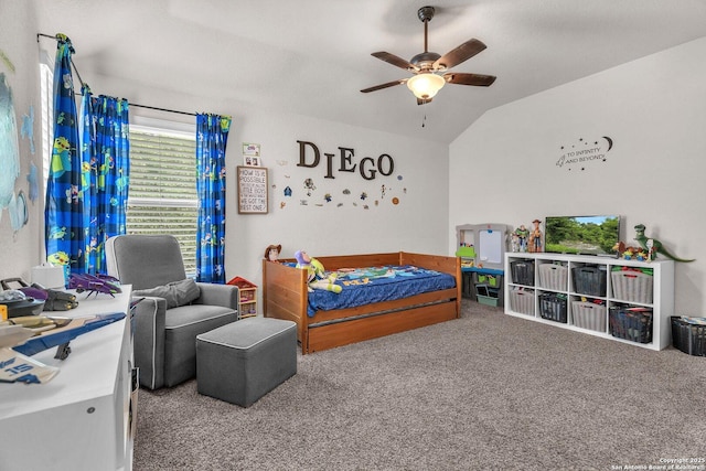 carpeted bedroom featuring a ceiling fan and lofted ceiling