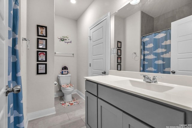bathroom featuring tile patterned flooring, vanity, toilet, a shower with shower curtain, and baseboards