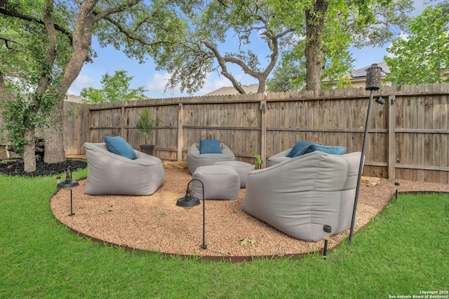 view of yard featuring a fenced backyard