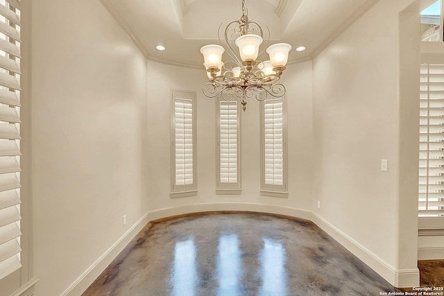 unfurnished dining area with crown molding, baseboards, concrete flooring, and a notable chandelier