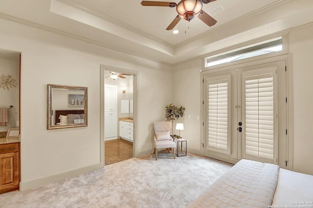 living area with crown molding, light colored carpet, recessed lighting, a raised ceiling, and a ceiling fan