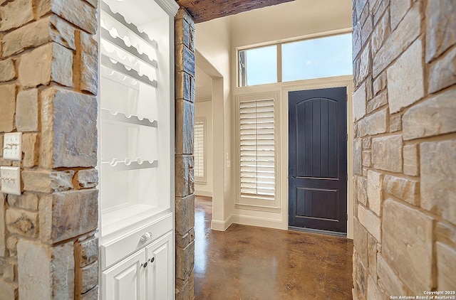 entryway featuring concrete floors