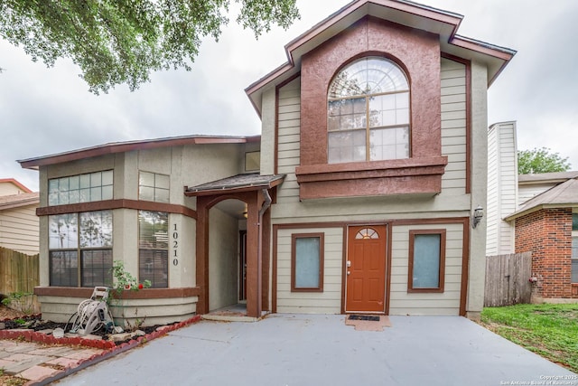 10210 Apricot Fld, San Antonio, TX 78245 - view of front of home with fence and a patio area