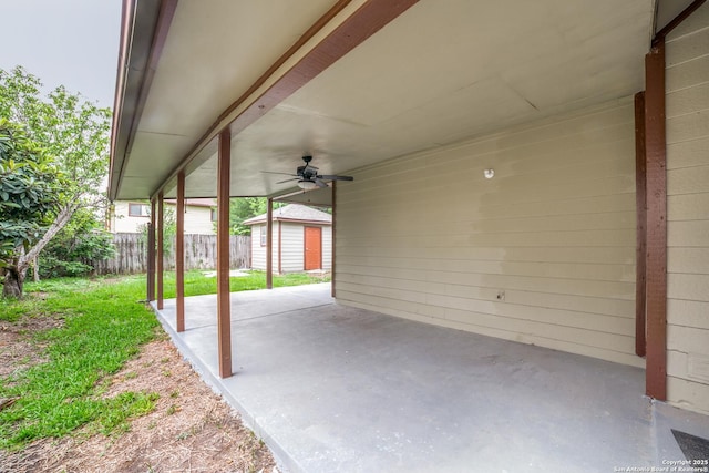 10210 Apricot Fld, San Antonio, TX 78245 - view of patio / terrace featuring an outdoor structure, fence, a ceiling fan, and a shed