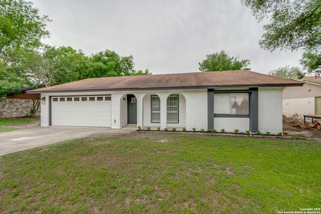 ranch-style home featuring a garage, covered porch, a front yard, brick siding, and concrete driveway