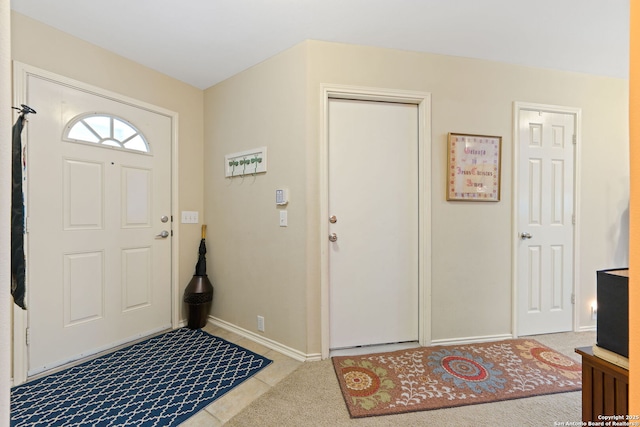 entryway featuring baseboards