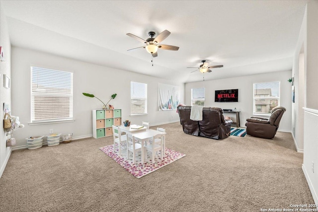 2927 Lindenwood, San Antonio, TX 78245 - living area featuring baseboards, ceiling fan, and carpet