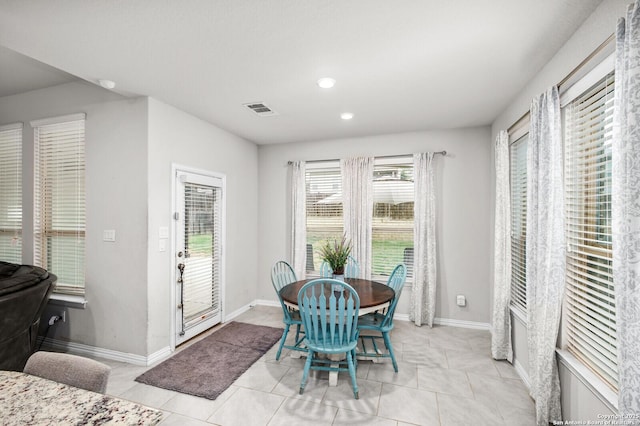 14447 Costa Leon, San Antonio, TX 78245 - dining space featuring light tile patterned floors, baseboards, and recessed lighting