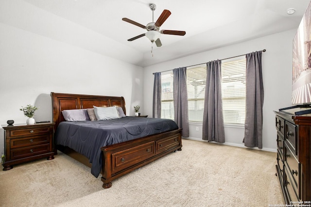 14447 Costa Leon, San Antonio, TX 78245 - bedroom featuring multiple windows, light carpet, baseboards, and a ceiling fan