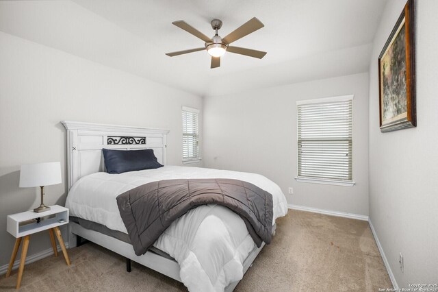 14447 Costa Leon, San Antonio, TX 78245 - carpeted bedroom featuring baseboards and ceiling fan