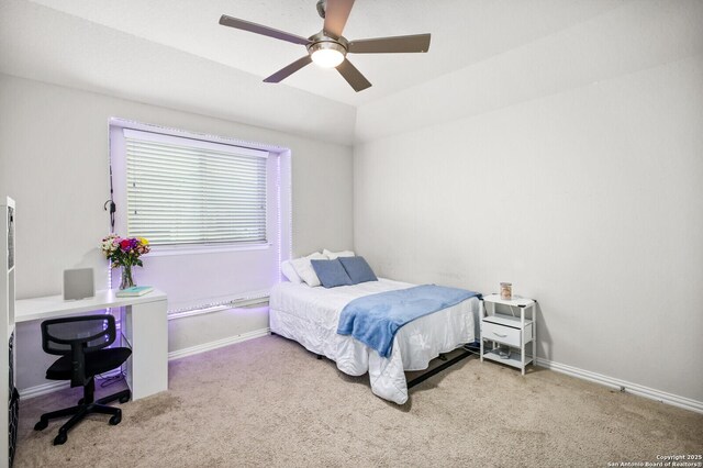 14447 Costa Leon, San Antonio, TX 78245 - bedroom with carpet flooring, ceiling fan, baseboards, and lofted ceiling