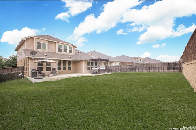 14447 Costa Leon, San Antonio, TX 78245 - rear view of property with a patio, brick siding, and roof with shingles