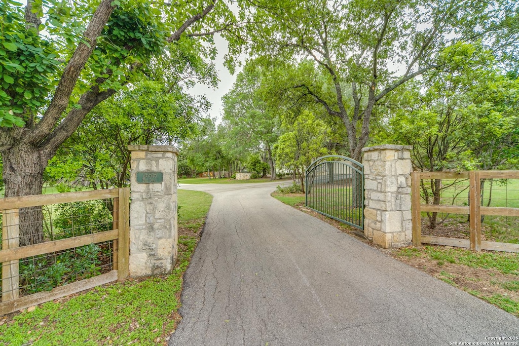 26515 Fire Dance, Boerne, TX 78006 - view of gate featuring fence