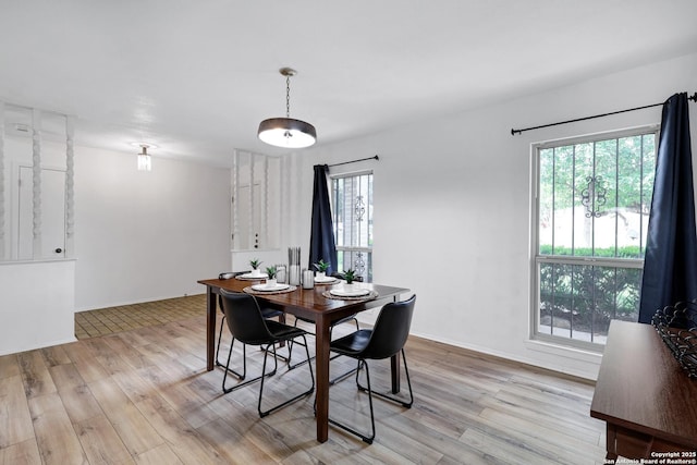 14320 Forum Rd, Universal City, TX 78148 - dining space with baseboards and light wood-type flooring