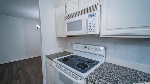 kitchen with white cabinets, backsplash, white appliances, and dark wood-type flooring