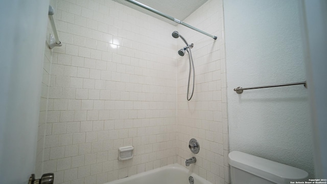full bathroom with shower / bathtub combination and toilet