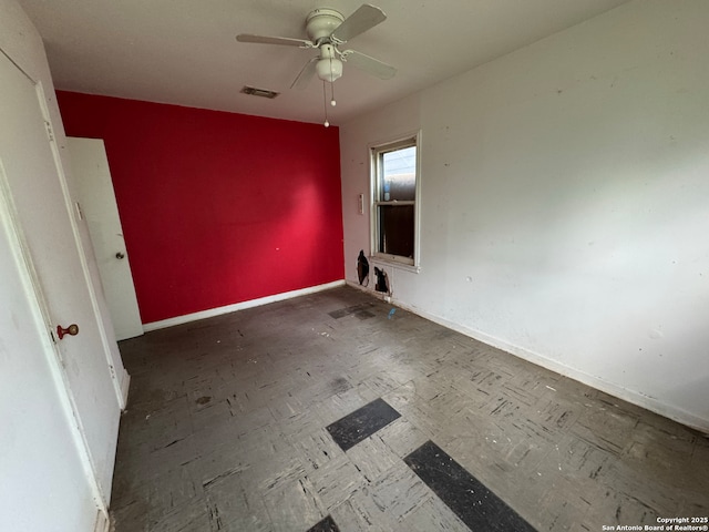 274 Gayle, San Antonio, TX 78223 - spare room with a ceiling fan, baseboards, and visible vents