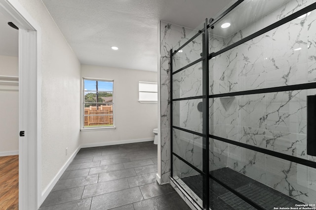 full bathroom with toilet, baseboards, recessed lighting, and a marble finish shower
