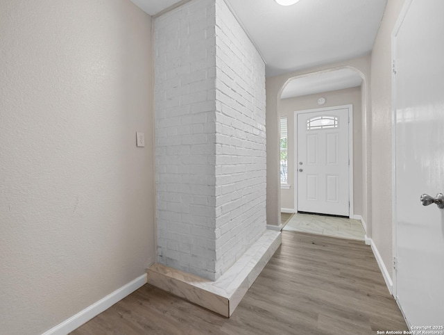 3354 Bob Billa, San Antonio, TX 78223 - foyer entrance featuring baseboards, arched walkways, and wood finished floors