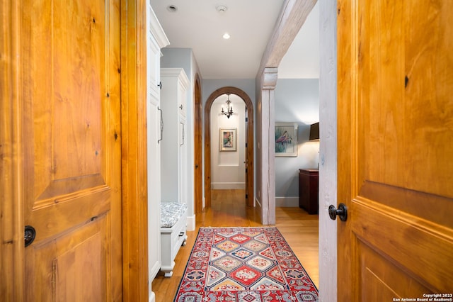 220 N School St, Boerne, TX 78006 - hall featuring arched walkways and light wood-style flooring