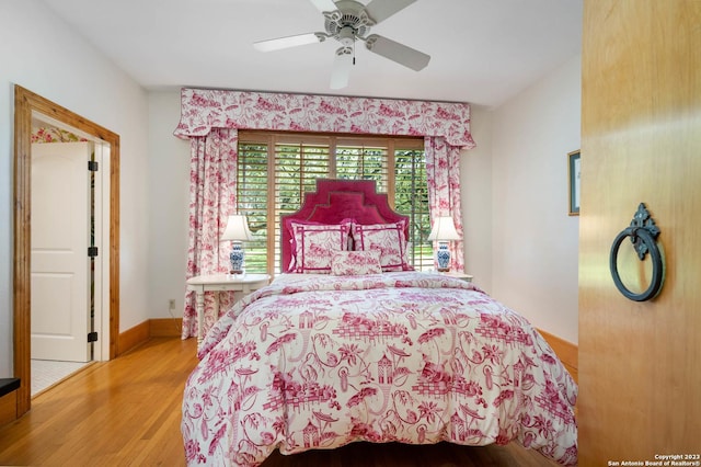 220 N School St, Boerne, TX 78006 - bedroom featuring baseboards, ceiling fan, and wood finished floors