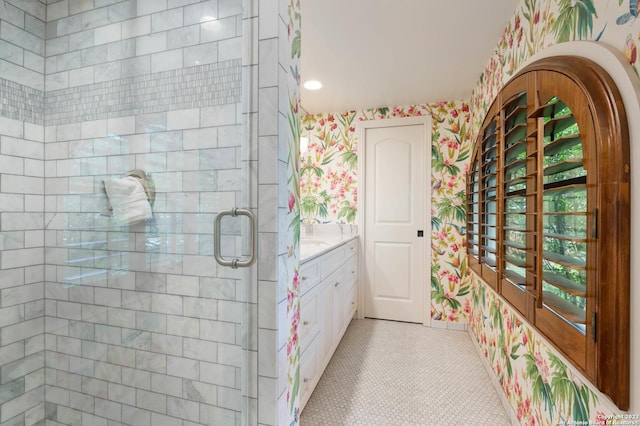220 N School St, Boerne, TX 78006 - full bathroom with vanity, tile patterned floors, a stall shower, and wallpapered walls