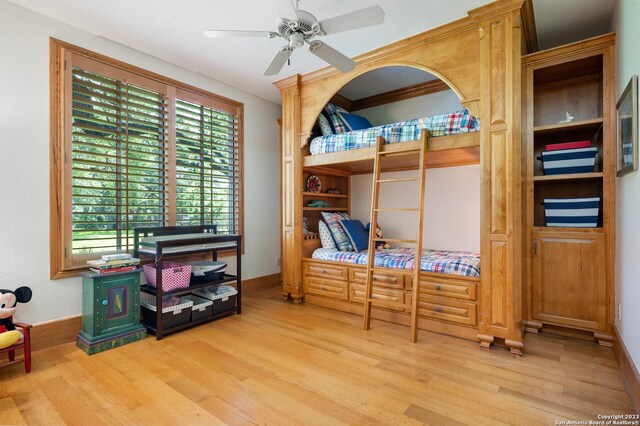 220 N School St, Boerne, TX 78006 - bedroom with baseboards and wood finished floors