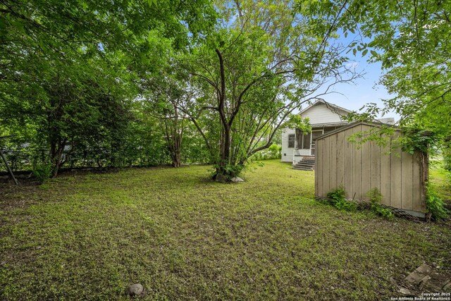 3403 W Travis, San Antonio, TX 78207 - view of yard with an outdoor structure and a shed