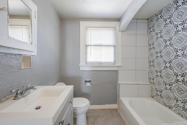 full bath featuring toilet, shower / bathing tub combination, tile patterned flooring, and vanity