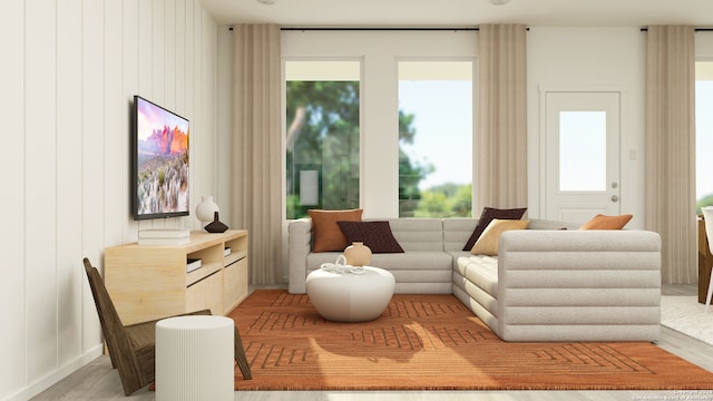 sitting room with light wood-style flooring