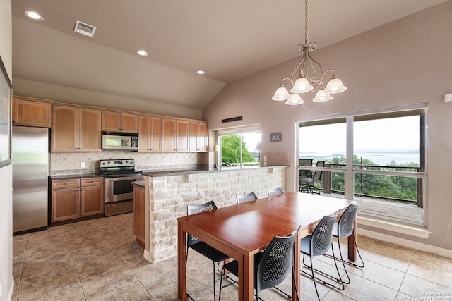 dining area with visible vents, vaulted ceiling, light tile patterned floors, a chandelier, and recessed lighting