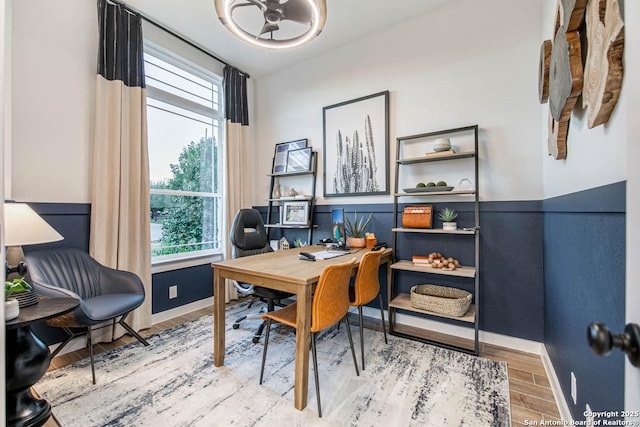 office with baseboards and wood finished floors