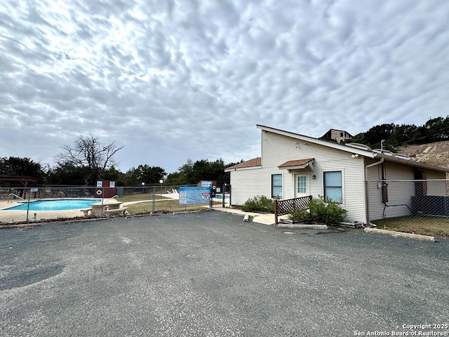 120 Sam Houston, Kerrville, TX 78028 - view of side of property with fence and a community pool